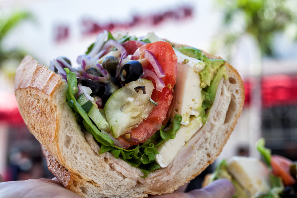 A freshly wrapped sandwich prepared to order